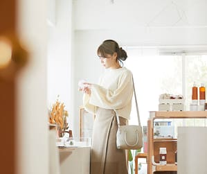 Minimalist lifestyle contrasting with cluttered spending addiction