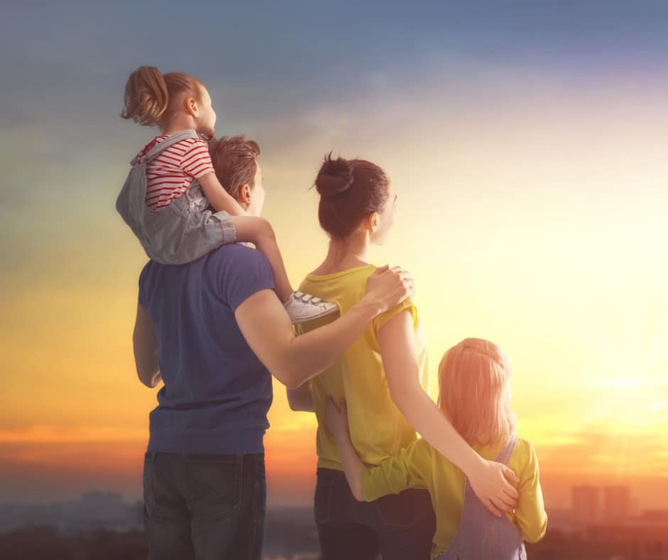 Parents and teens walking at sunset to strengthen family bonds