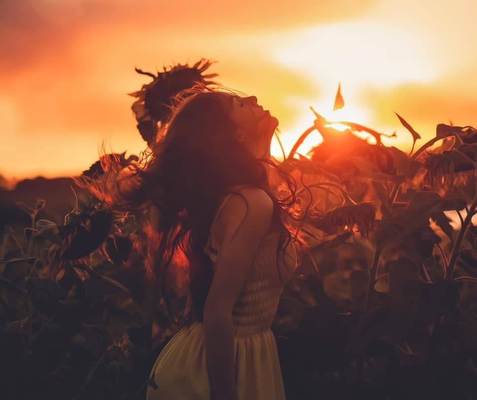 Finding purpose after losing everything—person walking into sunrise on empty road