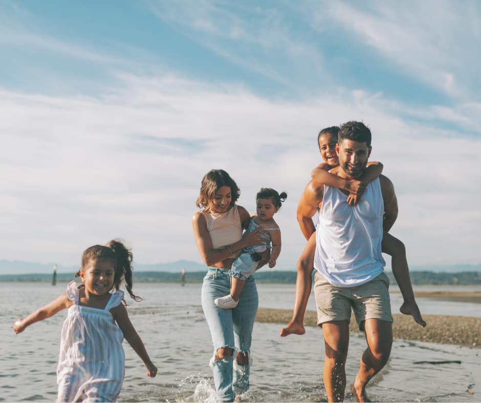 Joyful family after fixing the "family drains you" problem.